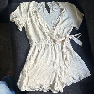 Hem and threads: Cream Wrap Romper with Tie Waist Sz L